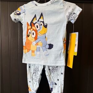 Blue and Orange Pajama Sets with Playful Cartoon Design